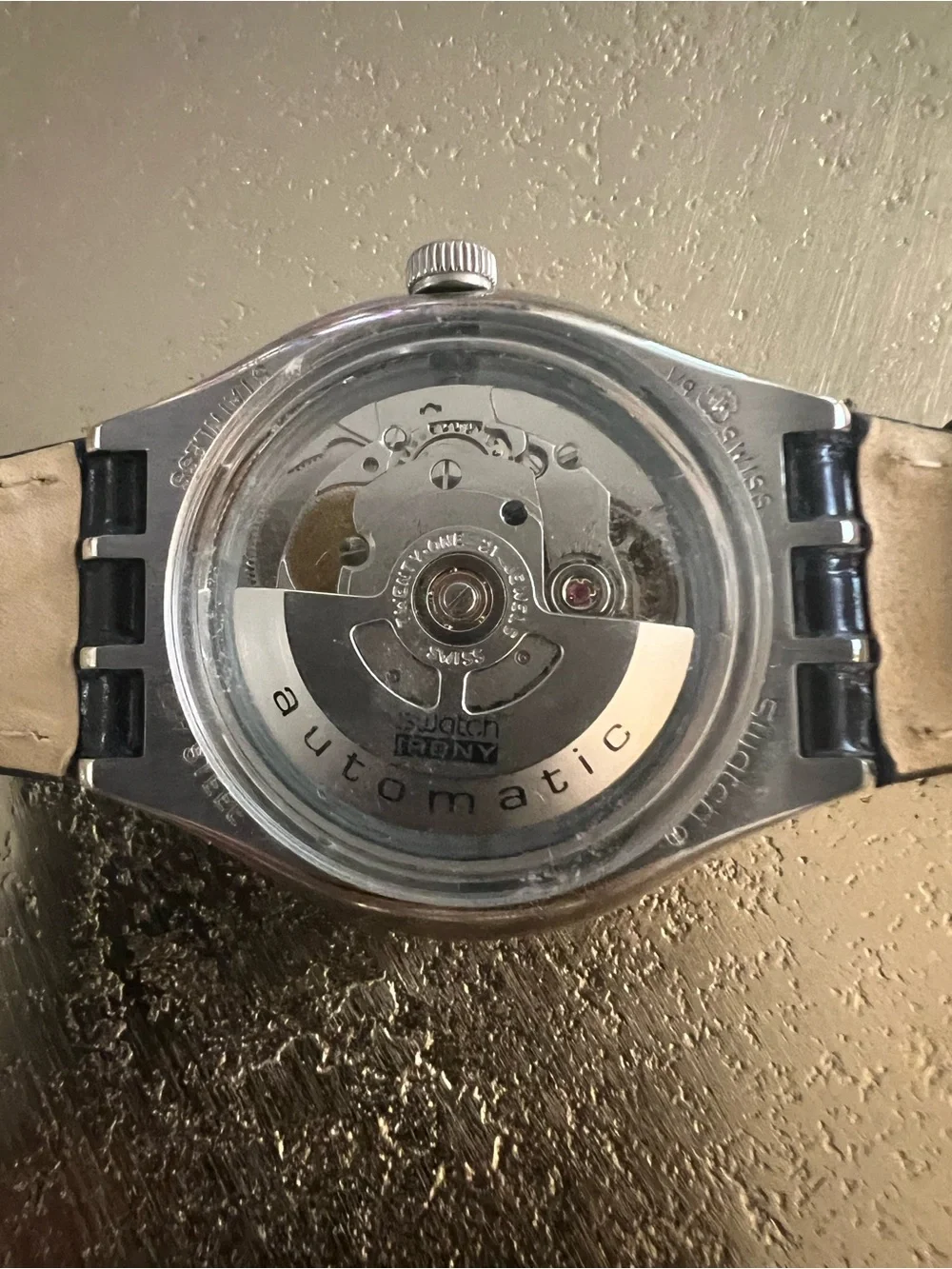 Swatch Silver Case Watch with Black Strap and White Dial